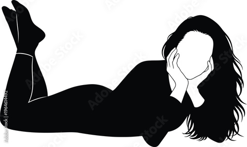 Woman in black lingerie and stockings reclining