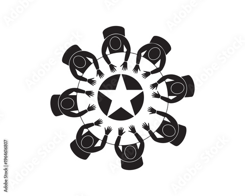 Overhead view of eight people sitting around a circular table with a large star in the center, symbolizing teamwork and