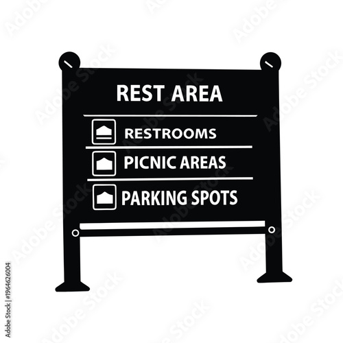 Black signpost indicating "Rest Area" with options for "Restrooms", "Picnic Areas", and "Parking Spots".