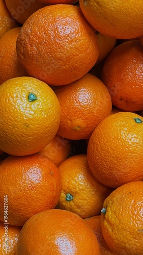 Vászonkép Close-up of fresh oranges piled together