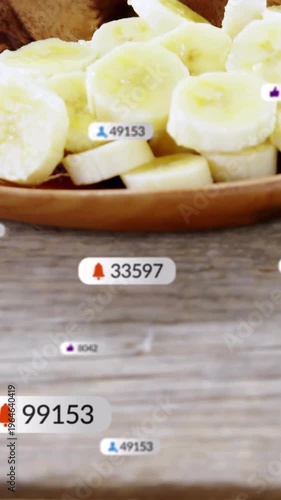 Vertical video: Banana plate sitting on table while badge popping over plate driving food metrics