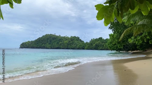 Beautiful beach views in the Sangihe Islands, North Sulawesi, Indonesia - january 30th 2026. White sand with open sea and coconut trees. 