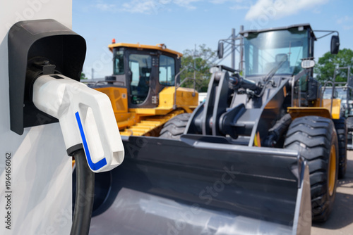 Wallpaper Mural Electric construction machines with charging station. Concept Torontodigital.ca
