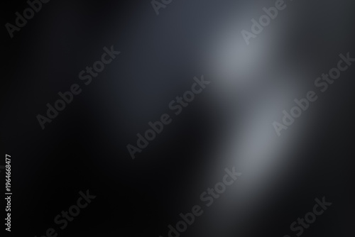 Minimalist dark grey gradient with soft diffused light and smooth textures