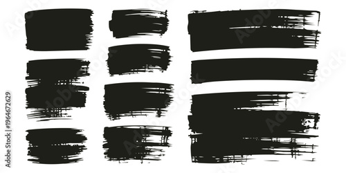 Collection of messy black thick ink brush strokes and grunge texture shapes isolated on a white background.