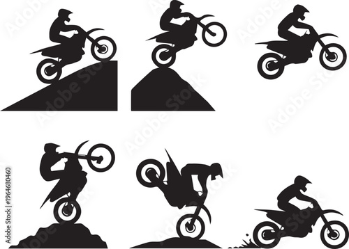 Motocross rider performing stunts on dirt bike