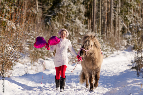 Happy Valentine's Day horse and rider with pink heart shaped shiny balloons.