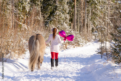Happy Valentine's Day horse and rider with pink heart shaped shiny balloons.