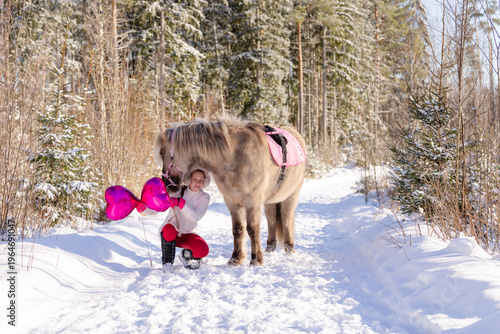 Happy Valentine's Day horse and rider with pink heart shaped shiny balloons.
