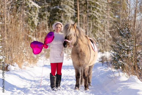 Happy Valentine's Day horse and rider with pink heart shaped shiny balloons.