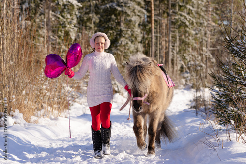Happy Valentine's Day horse and rider with pink heart shaped shiny balloons.