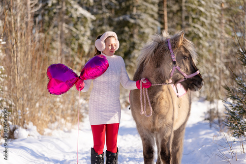 Happy Valentine's Day horse and rider with pink heart shaped shiny balloons.