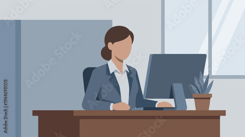 Businesswoman working at her desk with a computer in a modern office