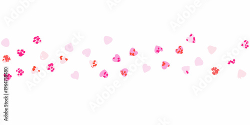 Abstract scattering of pink and red heart shapes on a white background