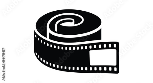 Black film reel with exposed leader a striking silhouette