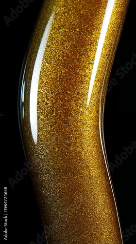 Curved gold glitter metallic surface on black background no people