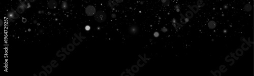 White glitter sparkles flow like magic dust. Soft bokeh highlights illuminate the dark background. Perfect for Christmas, winter, and holiday designs.