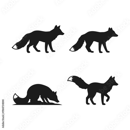 A set of four black fox silhouettes in different poses on a white background