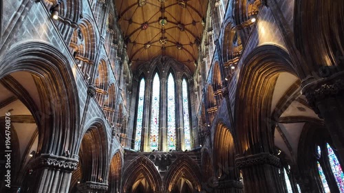 Interior of medieval Glasgow Cathedral with Gothic arches in Glasgow, UK
