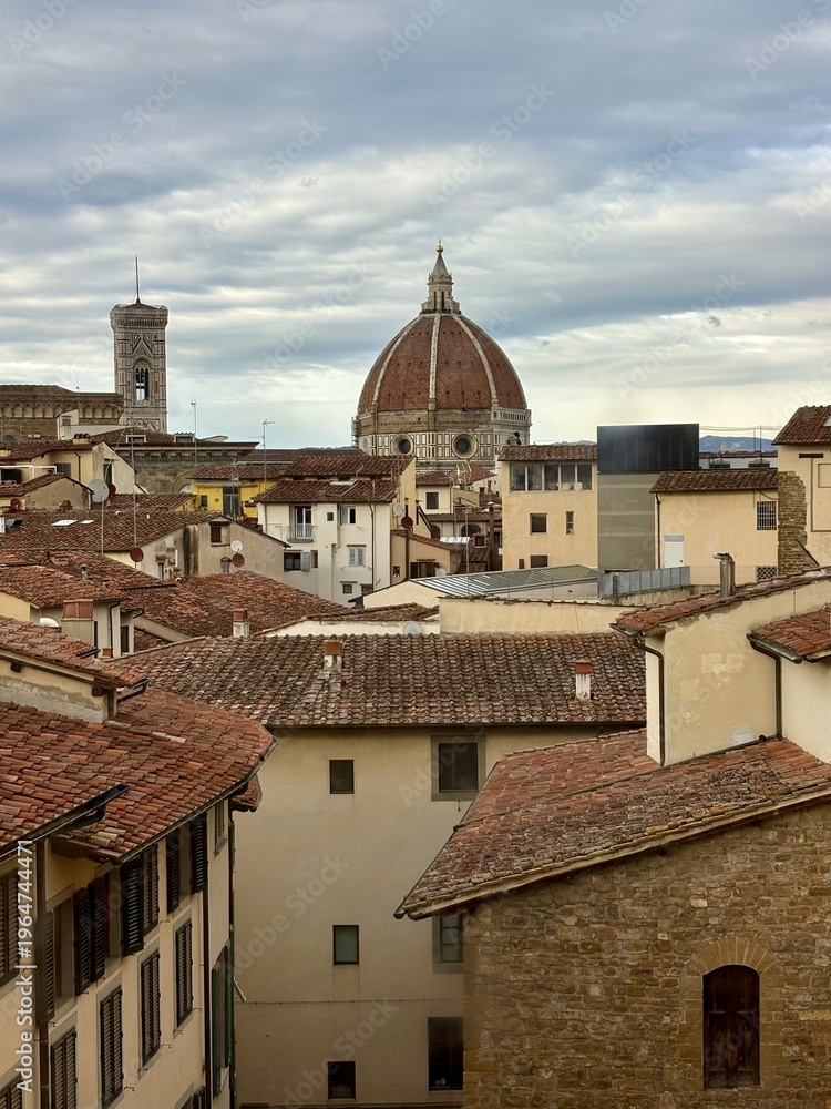 Obraz premium Panoramic view of Florence rooftops with the Duomo and Giotto's Bell Tower, Italy