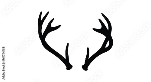 Dramatic black silhouette of deer antlers against a white background