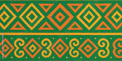 Abstract Vibrant green, orange, and yellow tribal pattern on fabric background with texture.