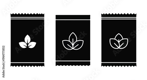 Three black seed packets with white leaf illustrations on a plain white background, simple graphic design elements.