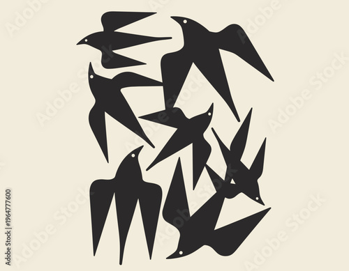 Flock of black birds in flight flying silhouette