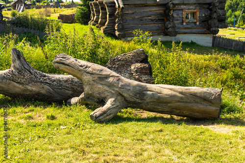Abalak, Tyumen Oblast, Russia. July 23, 2025: Abalak tourist and entertainment complex. The remains of a huge tree lie on the ground.