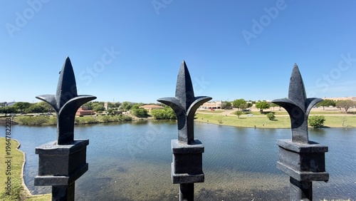 A landscape featuring a lake surrounded by trees in Fort Worth, Texas, USA.