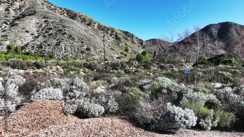  A Man Flying his UAV to survey the local earthquake faults looking at the San Andreas Fault Area near the Seven Oaks Dam 
