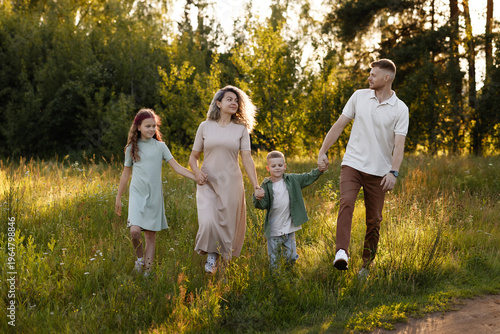 Photos Active Family Enjoying Fitness Adventure During Evening Hours Outside