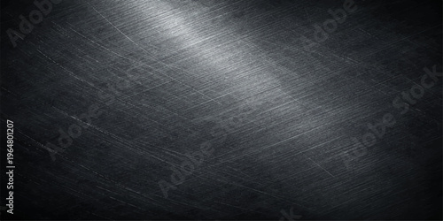 abstract metal texture that evokes a sense of strength, durability, and industrial aesthetic. The dark tones and subtle surface details of the brushed metallic finish add depth and visual interest.