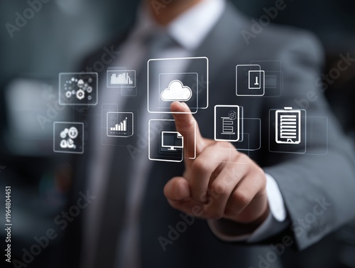 Man in Suit Interacts With Virtual Cloud Icons in Office Setting