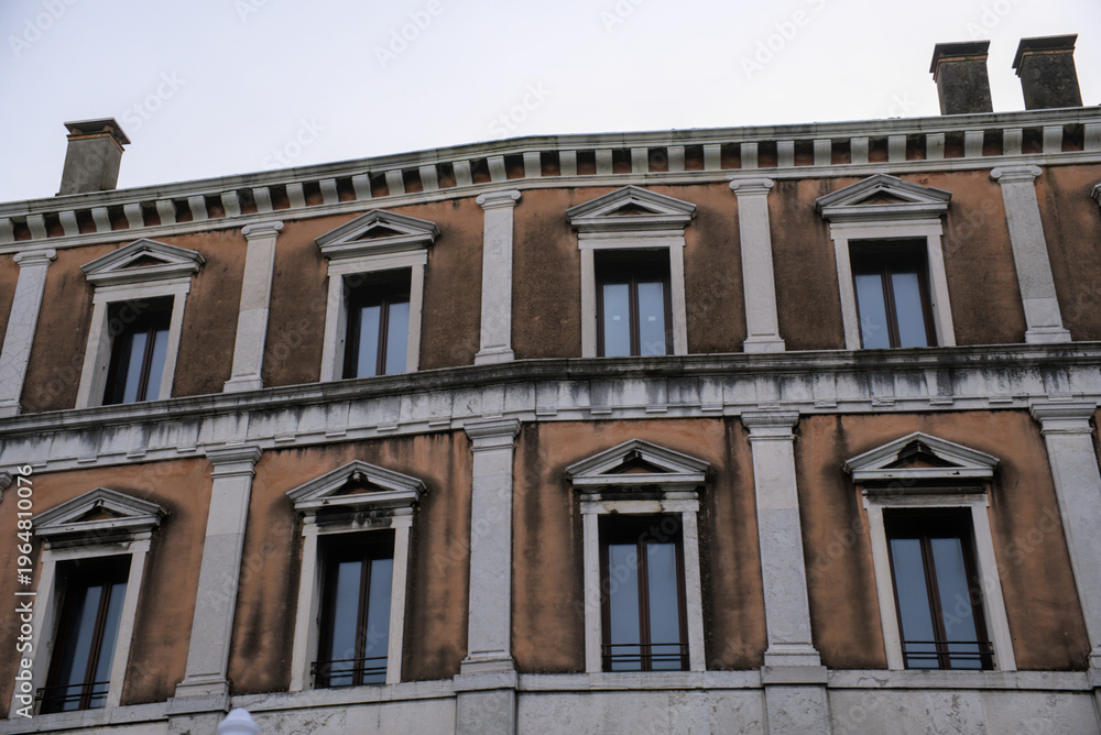 Fototapeta premium Rustic facade with arched windows