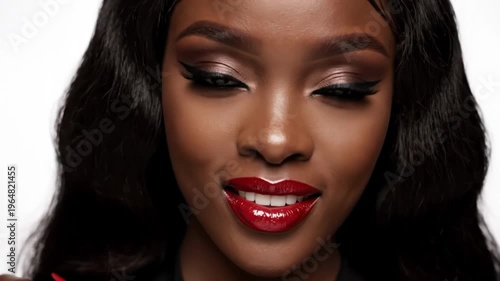 Closeup portrait of a woman with dramatic makeup and long dark hair