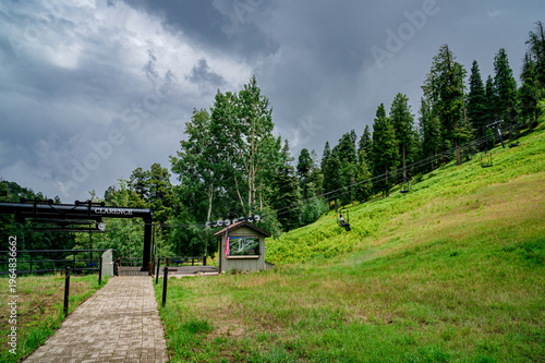Ski lift in the clouds and fog on a summer day in the Santa Catalina Mountains near Tucson Arizona