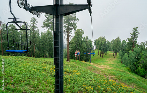 Ski lift in the clouds and fog on a summer day in the Santa Catalina Mountains near Tucson Arizona
