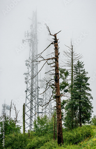 Communications tower on a foggy monsoon summer day in the Santa Catalina Mountains near Tucson Arizona