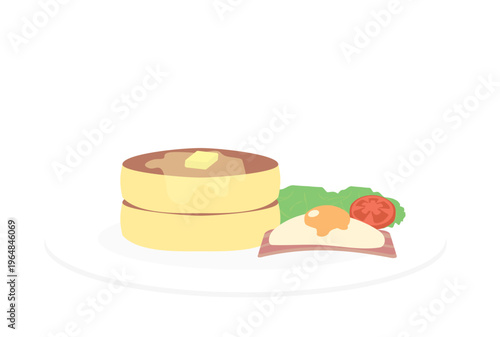 目玉焼きとベーコンとパンケーキの朝食