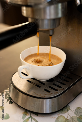 espresso machine pouring coffee
