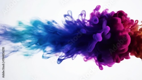 A vibrant, swirling cloud of teal, blue, and purple ink suspended in mid-air