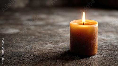 Softly Glowing Candle Illuminating a Dark Background with Gentle Light and Texture on a Rustic Surface