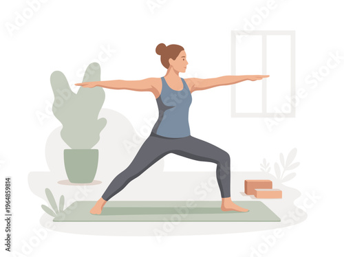 Woman practicing Warrior II yoga pose indoors.