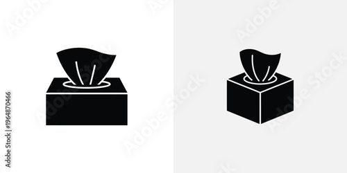 Black angled tissue box with one tissue sticking out on top