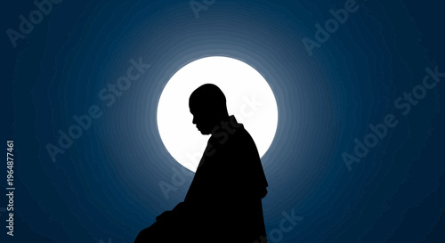 Silhouette of a person meditating outside.