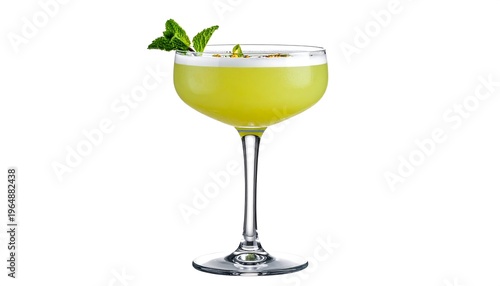 Tall glass filled with a vibrantly-colored drink, garnished with mint leaves, against white