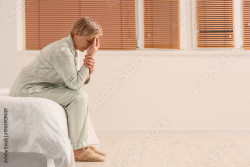 Mature woman experiencing m...
