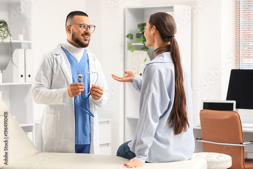 Male doctor with stethoscop...