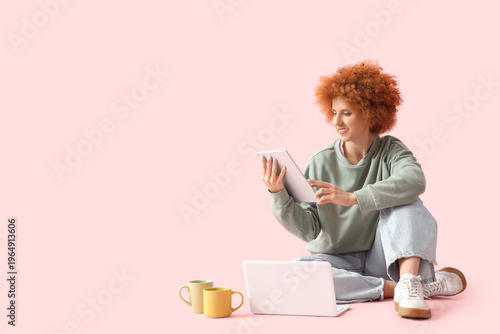 Redhead female freelancer w...